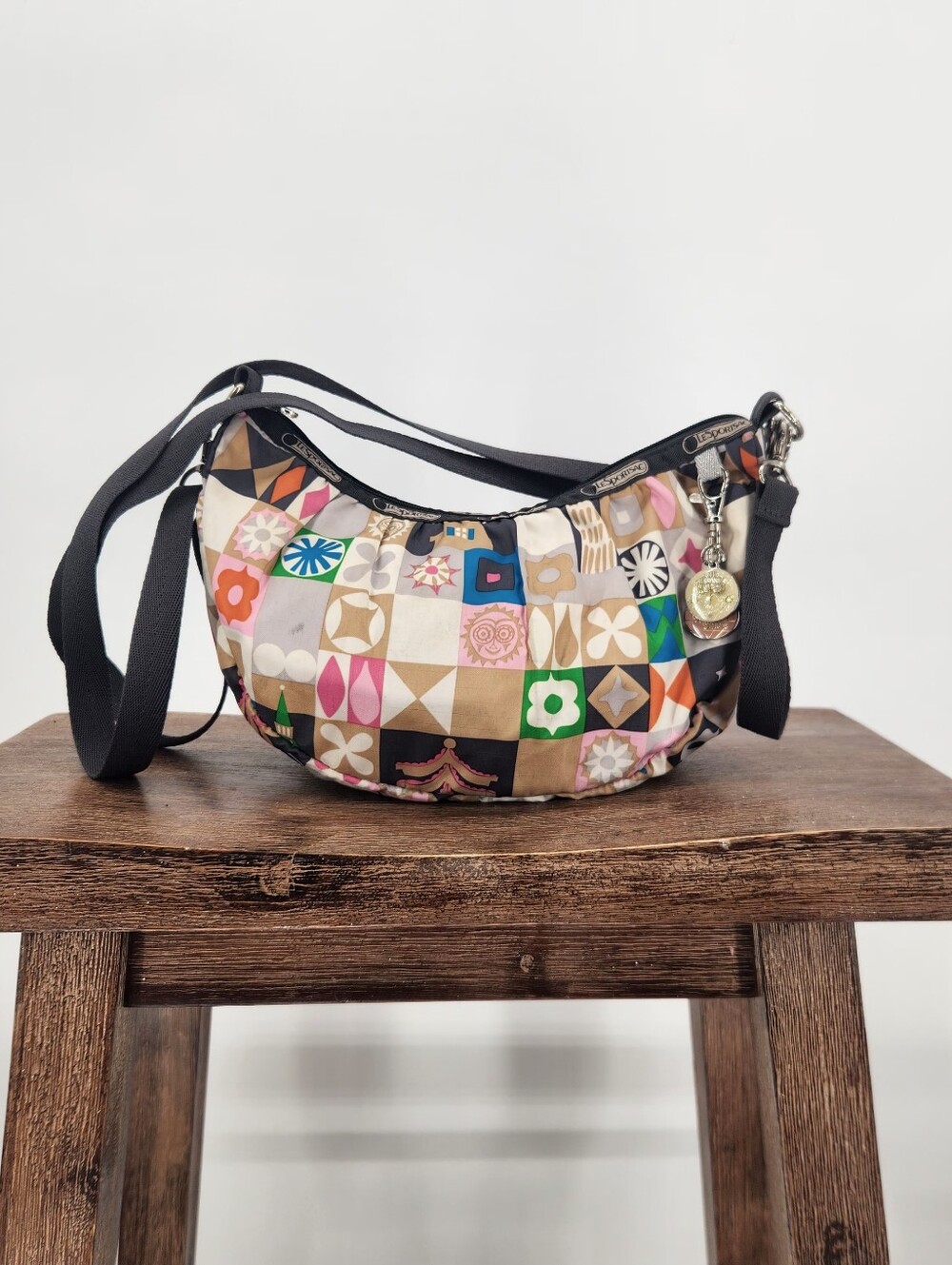 Lesportsac Disney It's a Small World Jessi Baby Bag Crossbody in Global Journey